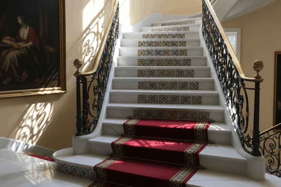 How to Design a Statement Staircase with Marble Treads and Tile Risers
