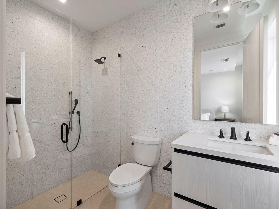 Bathroom Tile & Stone by Just Tile & Marble — finished South Florida project